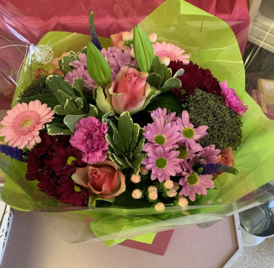 Berry Bliss - A rich and colourful bouquet combining soft pinks with deep berry tones and vibrant fresh greenery.
